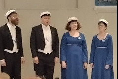 Turun yliopiston kuoron kvartetti esiinty Hamburger Börsissä sukuillallisella